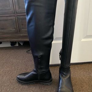 Leather over the knee boots with rubber lug sole